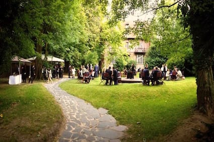 A corporate garden party in an elegant outdoor garden